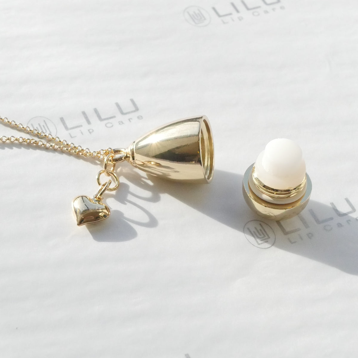 LEXI GOLD HEART REFILLABLE LIP BALM NECKLACE | LiLu Lip Care
