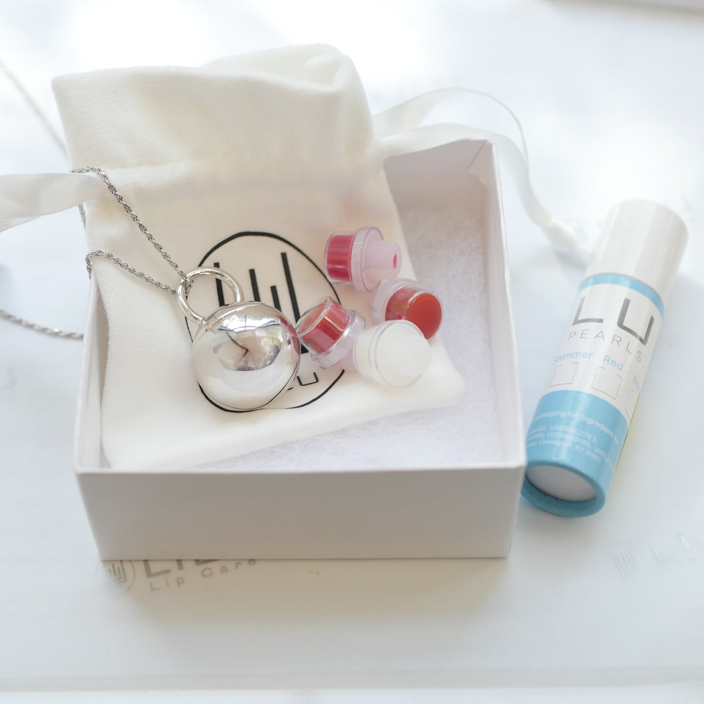 COSETTE .925 STERLING SILVER REFILLABLE LIP BALM NECKLACE- NEW! | LiLu Lip Care