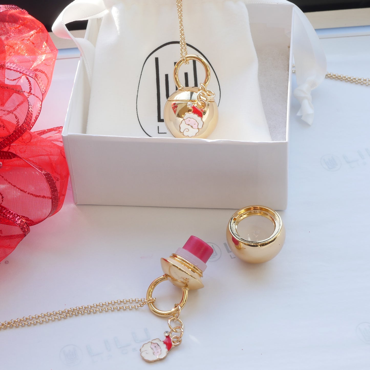 COSETTE GOLD W/ SANTA CHARM REFILLABLE LIP BALM NECKLACE  | LiLu Lip Care